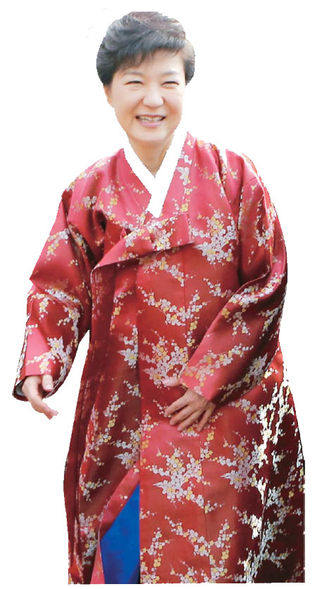 President Park wears Kim Young-seok’s deep red-colored topcoat at her inauguration on Feb. 25 this year. / Korea Times file