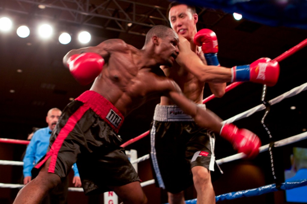 Kim (right) was the quicker fighter and possessed the stronger defense, but he just couldn’t muster enough punches to win. ((Photo - Brett Ostrowski, sharpexposures@gmail.com)