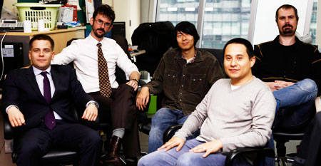 Mario Garcia, co-founder of Arcticpod, right in front row, and other CEOs and representatives of start-up companies supported by the Seoul Global Center’s incubation program pose at their office in the center’s building in Jongno, central Seoul, on Nov. 14. / Korea Times photo by Yoon Sung-won