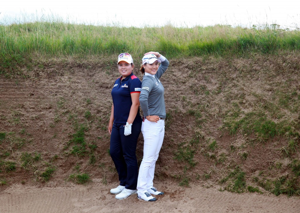 Park Inbee, left, and Ryu So Yeon, posed inside a bunker at British Women's Open. They finished 1-2 among Koreans on the money list this year. (Yonhap)