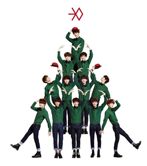 EXO members form a Christmas tree in this promotional photo