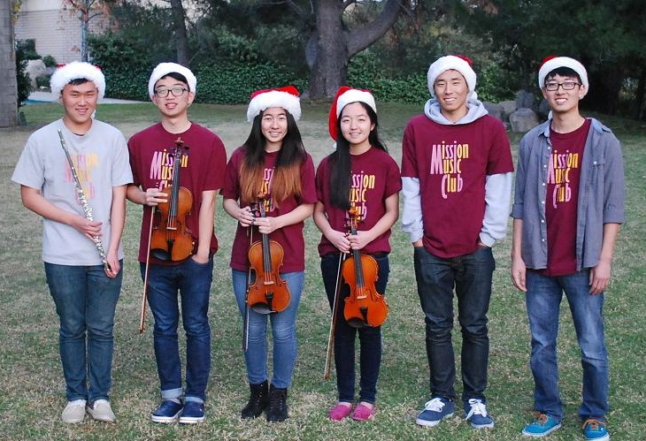 Robert Lee, second from left, and the Mission Music Club members are making senior citizens happy this holiday season.