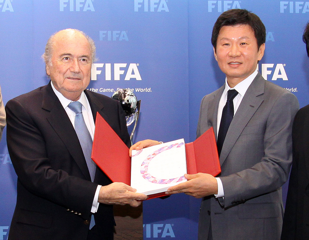 FIFA and its president Sepp Blatter has selected S. Korea as the host for 2017 U-20 World Cup .  Korean Football Association head Jung Mong-gyu, right, led the effort. (Yonhap)
