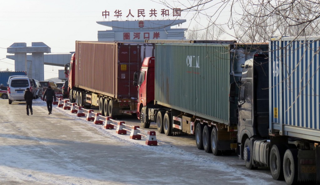 Chinese shipping container trucks are waiting to enter North Korea. (Yonhap)
