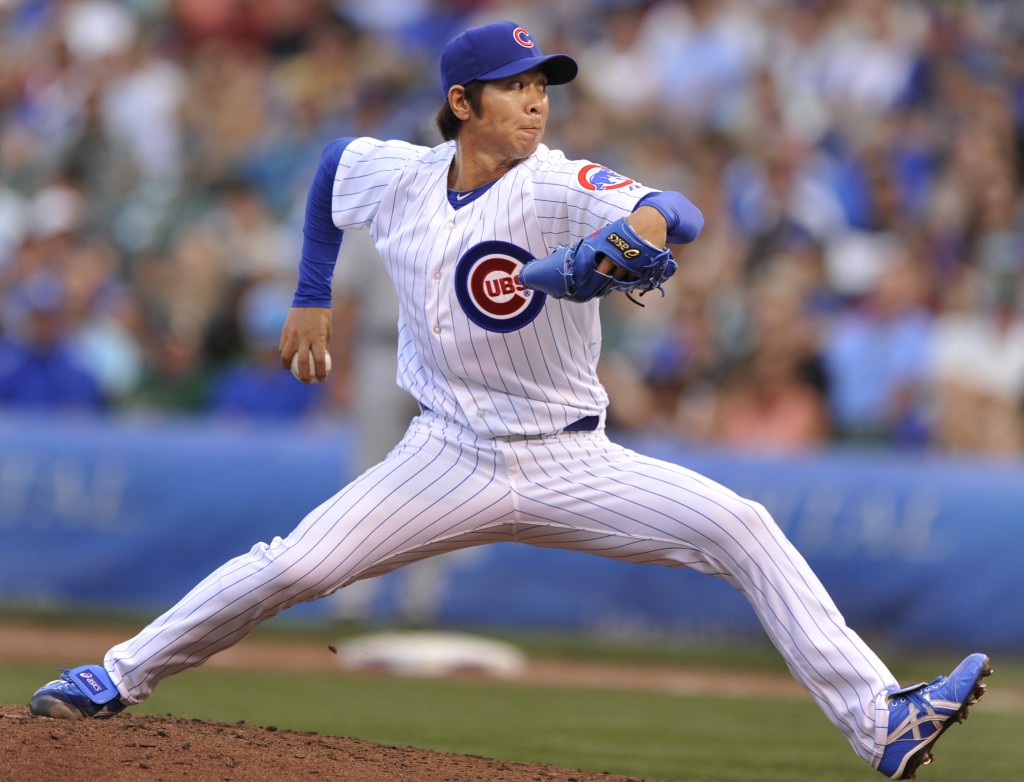 Chicago Cubs relief pitcher Chang-Yong Lim delivers a pitch during the seventh inning of a baseball game against the Milwaukee Brewers in Chicago, Saturday, Sept. 7, 2013. (AP Photo/Paul Beaty)