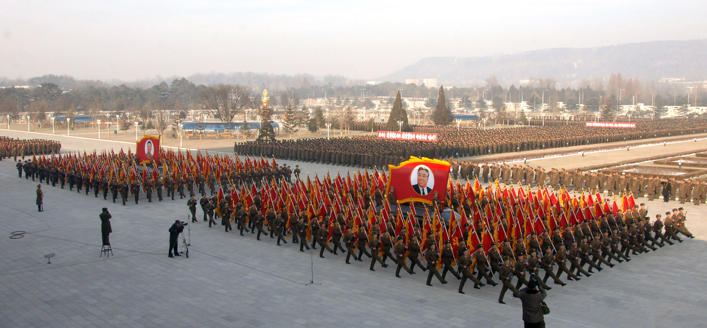 A military parade is under way at the plaza of the Kumsusan Palace of the Sun in Pyongyang on Dec. 16, 2013 to commemorate the second anniversary of the death of late North Korean leader Kim Jong-il. The North Korean soldiers said they are ready to die to defend leader Kim Jong-un. (KCNA-Yonhap)