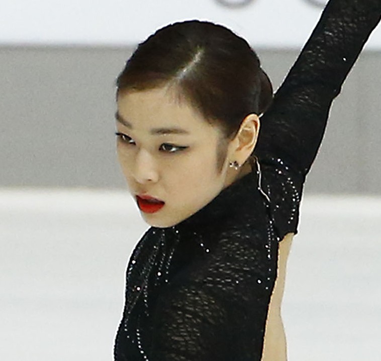 Kim Yuna proved she's perfectly capable of defending her Olympic title. (Yonhap)