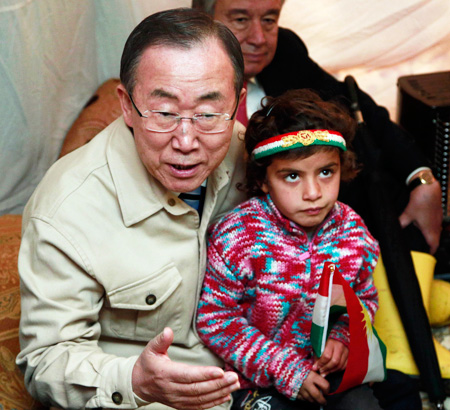 (AP-Yonhap) U.N. Secretary-General Ban Ki-moon sits inside a tent belonging to a Syrian family at a refugee camp in Irbil, 350 kilometers north of Baghdad, Iraq, Tuesday. Ban expressed his deep sadness over the suffering and the hard conditions the refugees are living in. The Syrian conflict, which began in March 2011, has killed more than 120,000 people, forced more than 2 million to flee the country and devastated the nation's cities, economy and social fabric.