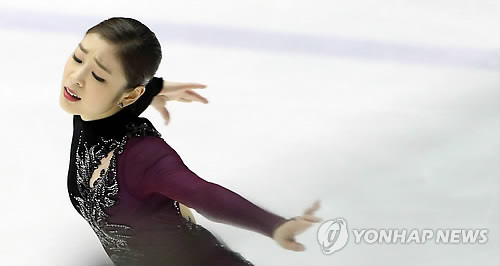 South Korean Kim Yuna performs during the women's free skate program at the Korea Figure Skating Championships in Goyang, South Korea, Jan. 5, 2014.(Yonhap) PYH2014010507300001300_P2
