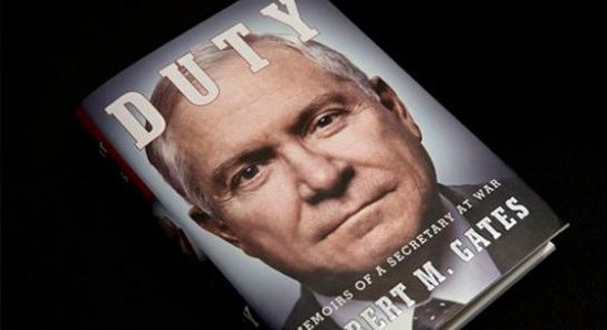 The book entitled: "Duty: Memoirs of a Secretary of War," by former Defense Secretary Robert Gates is seen in Washington, Wednesday, Jan. 8, 2014. The White House is bristling over former Defense Secretary Robert Gates' new memoir accusing President Barack Obama of showing too little enthusiasm for the U.S. war mission in Afghanistan and sharply criticizing Vice President Joe Biden's foreign policy instincts. (AP Photo/Jacquelyn Martin)