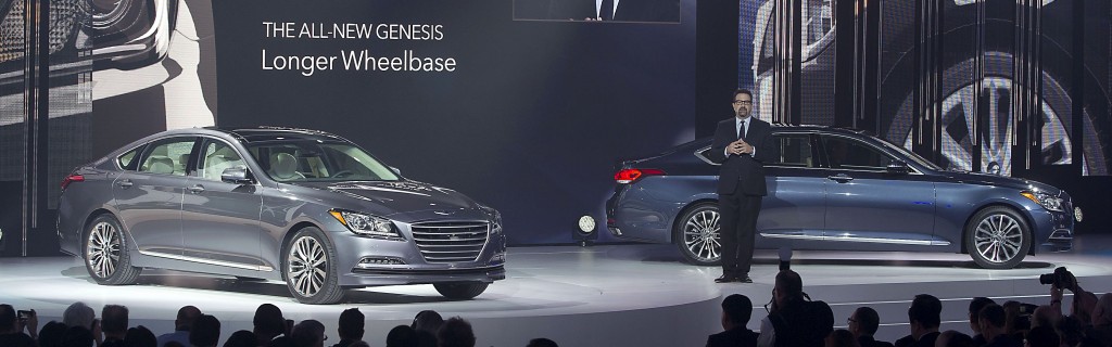It could be hazardous to be in the showroom when employees are moving cars around. All-new 2015 Hyundai Genesis sedan is being introduced at the  at the 2014 North American International Auto Show. (Yonhap)