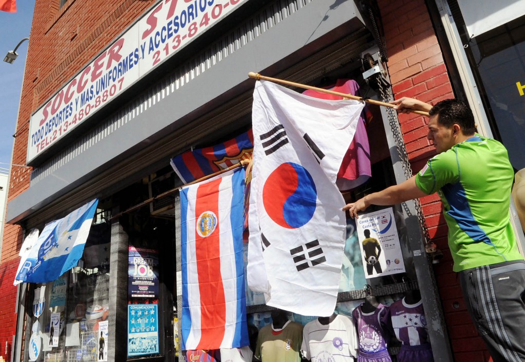 Korea vs. Costa Rica match in L.A. is getting a lot of interest from the Hispanic community also as both nations' flags are hanging outside of one local soccer shop. (Park Sang-hyuk)