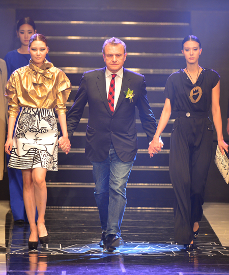 Participants in the ninth “Asia Model Festival Awards” are seen on stage at the opening show of French designer Castel Bajac, at the Olympic Hall in Jamsil, southern Seoul on Jan. 17. (Courtesy of KMA)