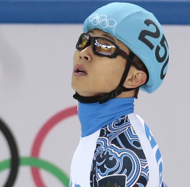 Viktor Ahn of Russia celebrates placing third in the men's 1500m short track speedskating final at the Iceberg Skating Palace during the 2014 Winter Olympics, Monday, Feb. 10, 2014, in Sochi, Russia. (AP Photo/Ivan Sekretarev)