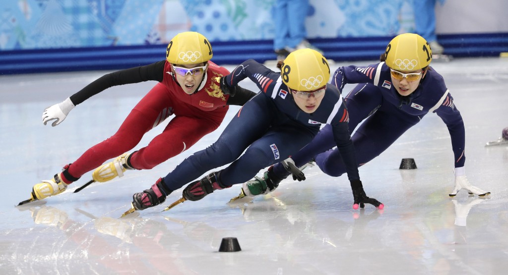 From left, Fan Kexin of China, Park Seung-hi of South Korea and Shim Suk-Hee of South Korea compete in the women's 1000m short track speedskating final at the Iceberg Skating Palace during the 2014 Winter Olympics, Friday, Feb. 21, 2014, in Sochi, Russia. (AP Photo/Bernat Armangue)