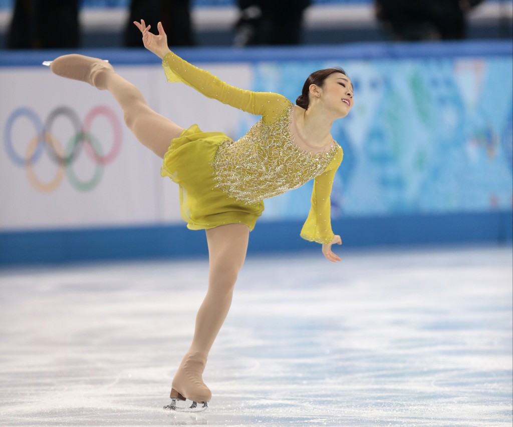 Kim Yuna of competes in the women's short program figure skating competition at the Iceberg Skating Palace during the 2014 Winter Olympics, Feb. 19, 2014, in Sochi, Russia. (AP Photo/Ivan Sekretarev)