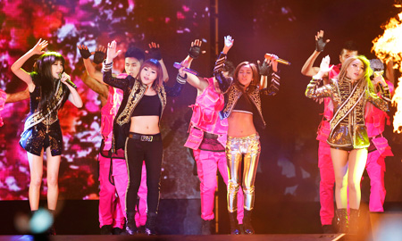 K-Pop girl group 2NE1 performs during their concert as part of their world tour, in Hong Kong, March 22. 2NE1 will appear as a guest act in the final of “America’s Next Top Model.” (Yonhap)
