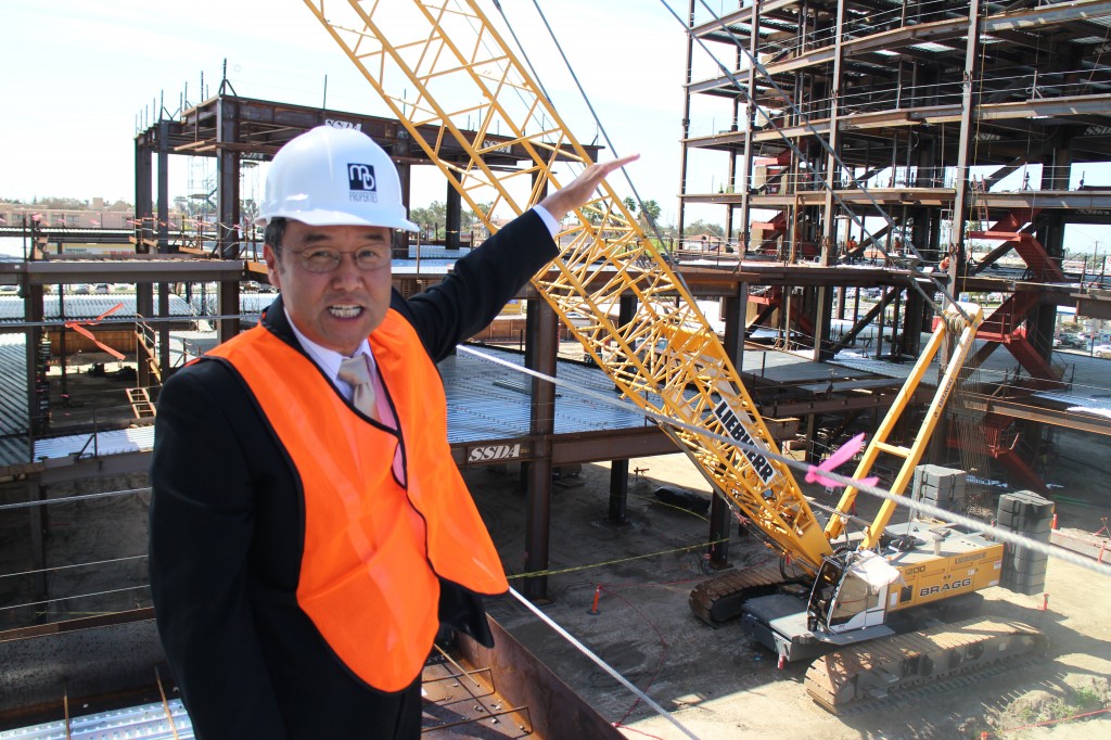 Jay Im, Real Estate Department VP of M+D Properties, is explaning about the construction of The Source.