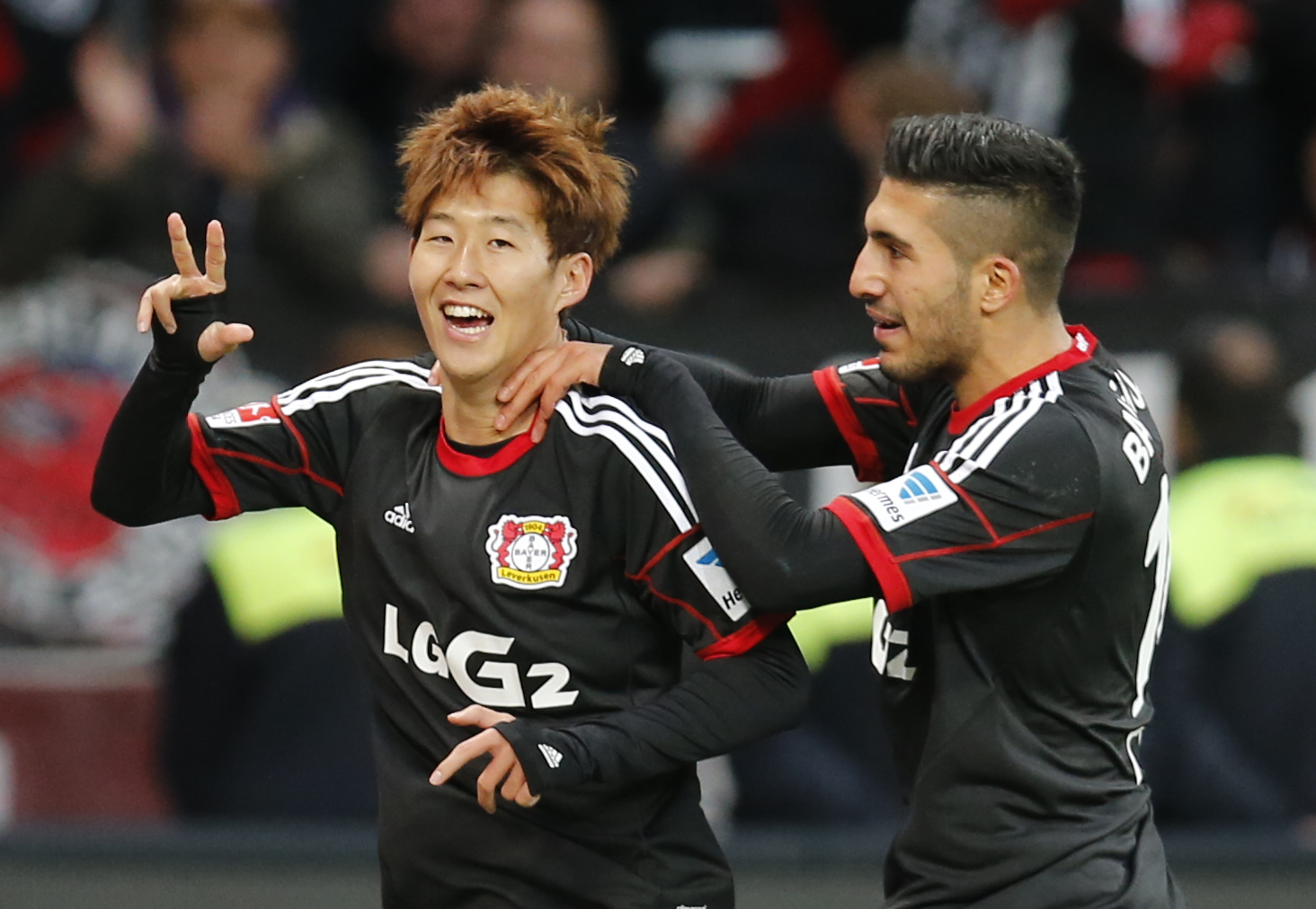 everkusen's Son Heung-min  of South Korea, left, and Leverkusen's Emre Can celebrate after scoring during the German first division Bundesliga soccer match between Bayer Leverkusen and Hamburger  SV  last year.