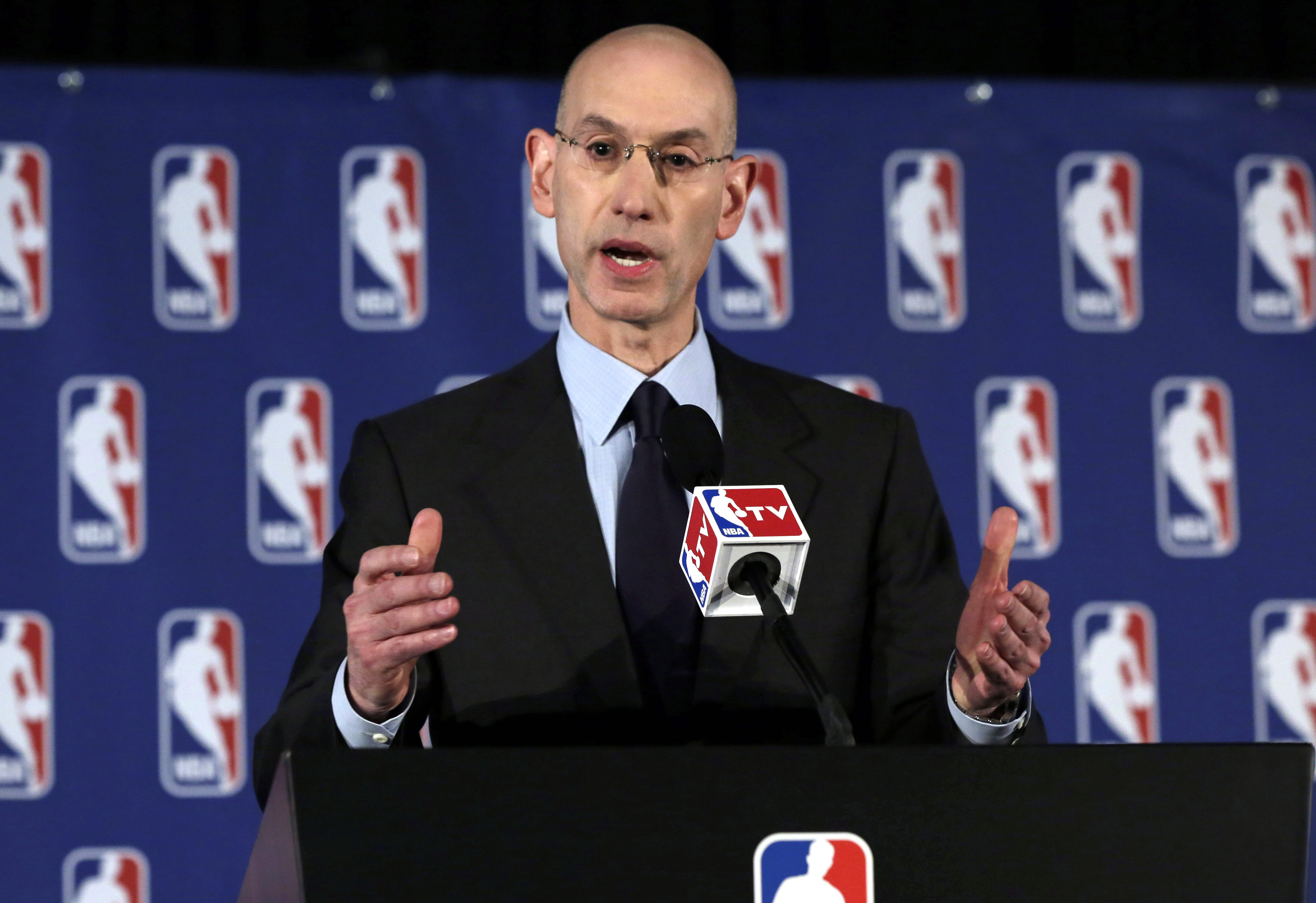 NBA Commissioner Adam Silver addresses the media during a news conference, in New York, Tuesday, April 29, 2014. Silver announced that Los Angeles Clippers owner Donald Sterling has been banned for life by the league in response to racist comments the league says he made in a recorded conversation. (AP Photo/Richard Drew)