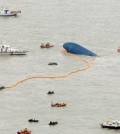 Strong winds and waves as well as swift currents, poor weather, low visibility and cold water prevented them from getting inside the shipwreck, raising fears of more casualties. (Yonhap)