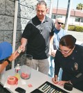 Tina Nieto, commanding officer of the LAPD's Olympic division, participates in the fundraiser Thursday.