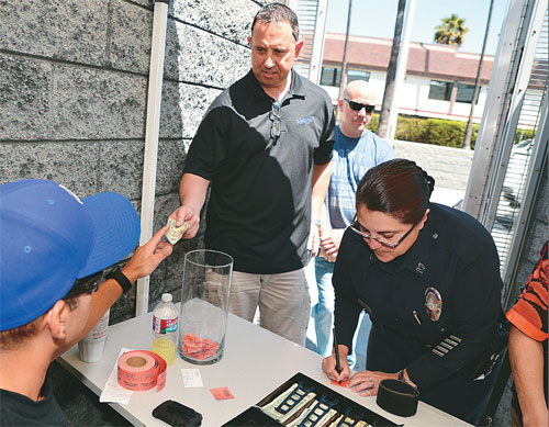 Tina Nieto, commanding officer of the LAPD's Olympic division, participates in the fundraiser Thursday.