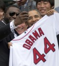 In this Tuesday, April 1, 2014, file photo, Boston Red Sox designated hitter David "Big Papi" Ortiz takes a selfie with President Barack Obama, holding a Boston Red Sox jersey presented to him, during a ceremony on the South Lawn of the White House in Washington, where the president honored the 2013 World Series baseball champion Boston Red Sox. Ortiz tweeted the selfie to his followers Tuesday, and it was resent by tens of thousands, including Samsung, which retweeted it as an ad. The White House press secretary says Obama was not aware that the photo was part of a marketing stunt. (AP Photo/Carolyn Kaster, File)