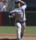 Los Angeles Dodgers pitcher Ryu Hyun-jin, from South Korea, throws against the San Francisco Giants during the first inning of a baseball game in San Francisco, Thursday, April 17, 2014. (AP Photo/Jeff Chiu)