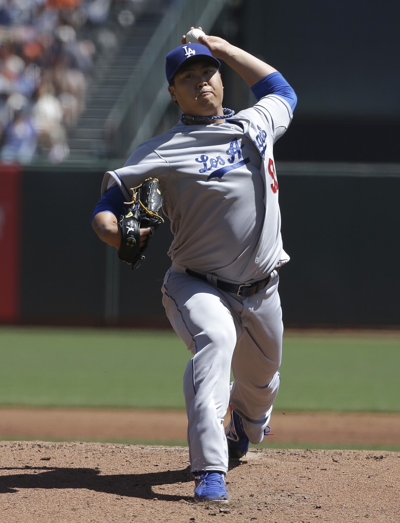 Los Angeles Dodgers pitcher Ryu Hyun-jin, from South Korea, throws against the San Francisco Giants during the first inning of a baseball game in San Francisco, Thursday, April 17, 2014. (AP Photo/Jeff Chiu)