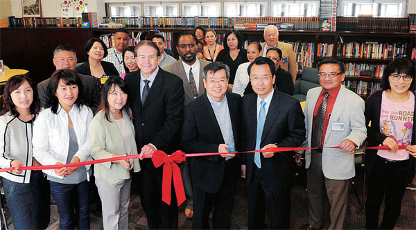 YNOT at the opening ceremony of its fifth "Library of Love" at Dorothy Kirby Center on Thursday. (The Korea Times/Park Sang-hyuk)