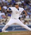 Los Angeles Dodgers starting pitcher Hyun-Jin Ryu throws in the fourth inning of a baseball game against the Cincinnati Reds, Monday, May 26, 2014, in Los Angeles. (AP Photo/Gus Ruelas)