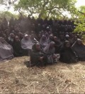 In this  photo taken from video  by Nigeria's Boko Haram terrorist network, Monday May 12, 2014 shows the alleged missing girls abducted from the northeastern town of Chibok. The new video purports to show dozens of abducted schoolgirls, covered in jihab and praying in Arabic. It is the first public sight of the girls since more than 300 were kidnapped from a northeastern school the night of April 14  exactly four weeks ago. (AP Photo)