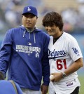 South Korean pitchers Ryu Hyun-jin and Park Chan Ho have both enjoyed success with the Dodgers. Now, a group of South Korean investors want to purchase 20 percent of the team. (AP)