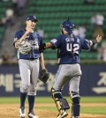 Charlie Shirek, left, and Kim Tae-koon celebrate the no-hitter. (Yonhap)