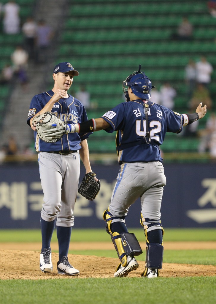 Charlie Shirek, left, and Kim Tae-koon celebrate the no-hitter. (Yonhap)
