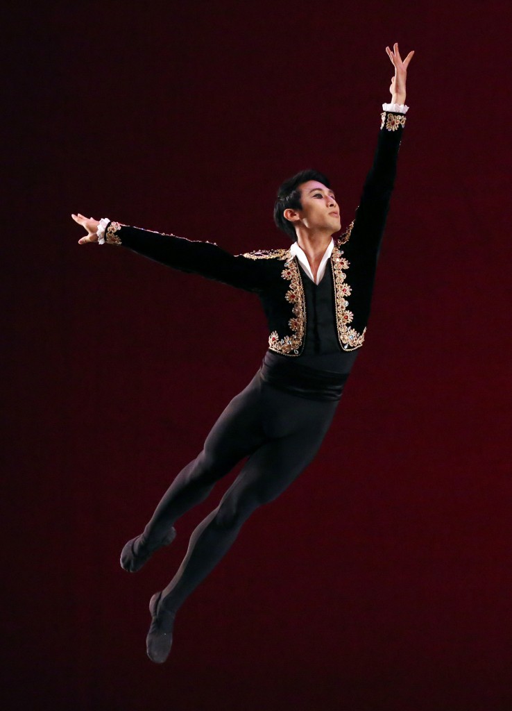 Senior Men's gold medalist Jeong Hansol of the Republic of Korea performs a solo dance from "Don Quixote, Grand Pas de Deux," during the Awards Gala of the USA International Ballet Competition  in Jackson, Miss., Saturday, June 28, 2014. Dancers from around the world competed in the ballet competition, held every four years. The 2014 competition had 97 competitors vying for medals, scholarships, cash awards and company contracts in the "Olympic-style" competition. (AP Photo/Rogelio V. Solis)