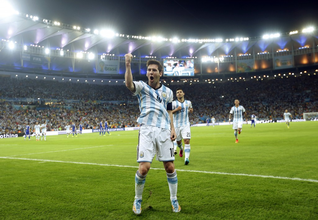 Argentina's Lionel Messi celebrates scoring his side's second goal during the group F World Cup soccer match between Argentina and Bosnia at the Maracana Stadium in Rio de Janeiro, Brazil, Sunday, June 15, 2014.     (AP Photo/Victor R. Caivano)