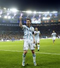 Argentina's Lionel Messi celebrates scoring his side's second goal during the group F World Cup soccer match between Argentina and Bosnia at the Maracana Stadium in Rio de Janeiro, Brazil, Sunday, June 15, 2014. (AP Photo/Victor R. Caivano)