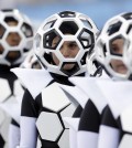 Actors perform during the opening ceremony before the group A World Cup soccer match between Brazil and Croatia, the opening game of the tournament, in the Itaquerao Stadium in Sao Paulo, Brazil, Thursday, June 12, 2014.  (AP Photo/Andre Penner)