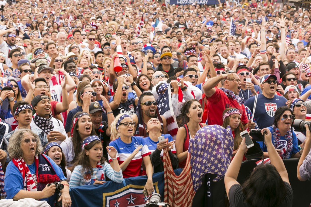 US soccer fans react as they watch the telecast of the 2014 Brazil World Cup soccer match between United States and Germany in Hermosa Beach, Calif., Thursday, June 26, 2014.  (AP Photo/Damian Dovarganes)