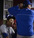 Choo Shin-soo is seen here listening to Rangers' batting coach Dave Magadan. (AP)