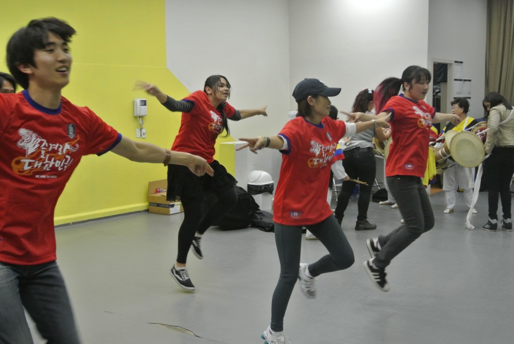 Korean Brazilians practice for the street cheer that will take place on June 17 and June 21.