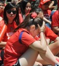 A fan watches Korea's 4-2 loss against Algeria on Sunday in Koreatown. (Park Sang-hyuk / The Korea Times)