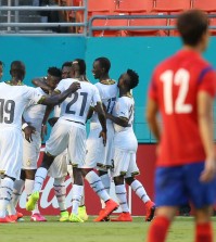 Ghana players celebrate after their second goal. (Yonhap)
