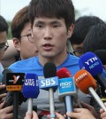 South Korean midfielder Han Kook-young speaks to reporters on June 3, 2014, in Miami before the team's practice at St. Thomas University.