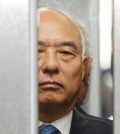 The face of troubled Prime Minister nominee Moon Chang-keuk is seen between closing elevator doors. He finally withdrew his name Tuesday.