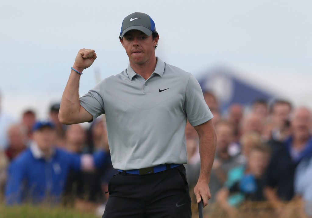 Rory McIlroy of Northern Ireland celebrates after playing an eagle on the 16th hole during the third day of the British Open Golf championship at the Royal Liverpool golf club, Hoylake, England, Saturday July 19, 2014. (AP Photo/Jon Super)