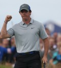 Rory McIlroy of Northern Ireland celebrates after playing an eagle on the 16th hole during the third day of the British Open Golf championship at the Royal Liverpool golf club, Hoylake, England, Saturday July 19, 2014. (AP Photo/Jon Super)