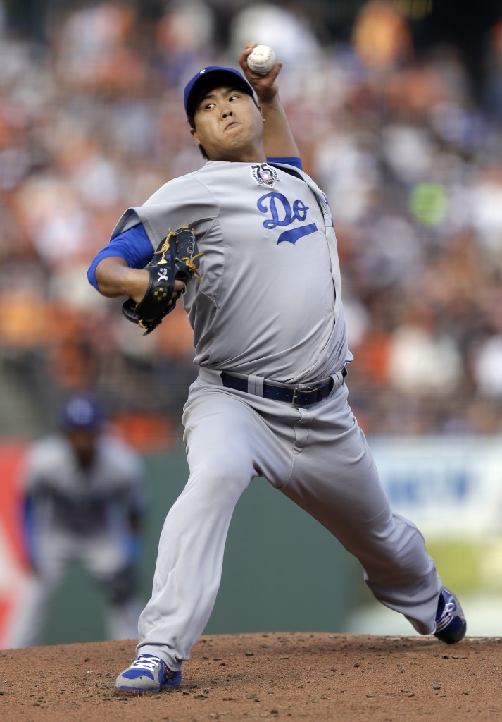 Los Angeles Dodgers' Hyun-Jin Ryu works against the San Francisco Giants in the first inning of a baseball game Sunday, July 27, 2014, in San Francisco. (AP Photo/Ben Margot)